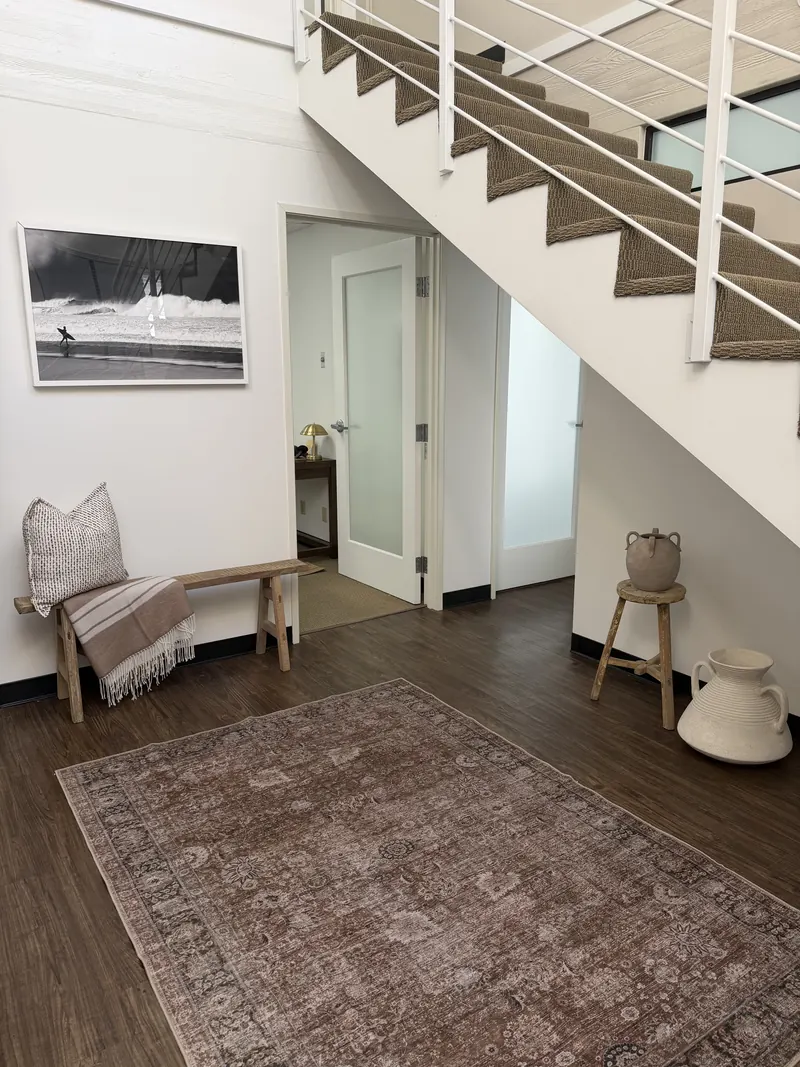 Entry hall and staircase at the Bodhi Wellness Collective office